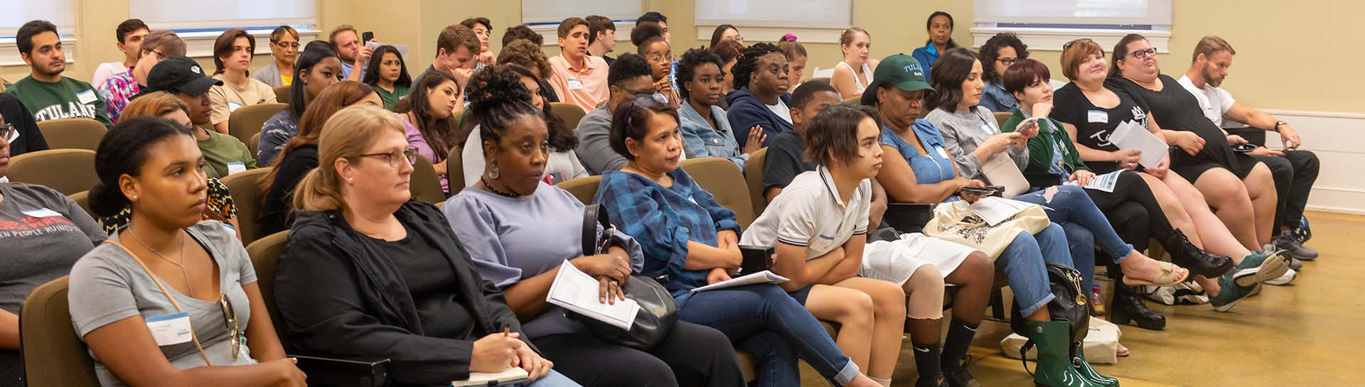 group of Tulane SoPA students in a lecture hall - Tulane SoPA