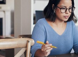 Woman Writing a resume