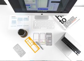 Overhead view of designer's desk with equipment - Tulane School of Professional Advancement