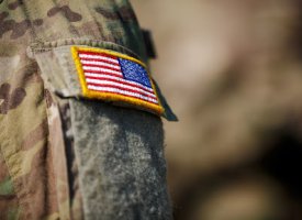 A military uniform with an American flag patch