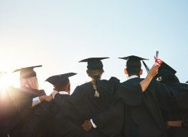 A group of graduates standing together