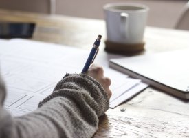 A student taking notes