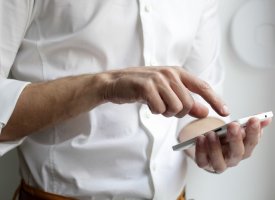 A business person using a smartphone