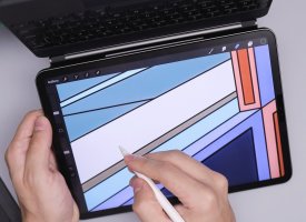 A person designing on a tablet