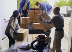 Nonprofit workers loading up a truck